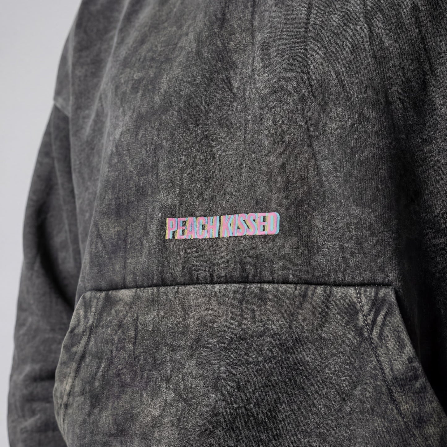 Peach kissed | Boxy fit acid washed black printed hoodie PEACH X JUVENILE