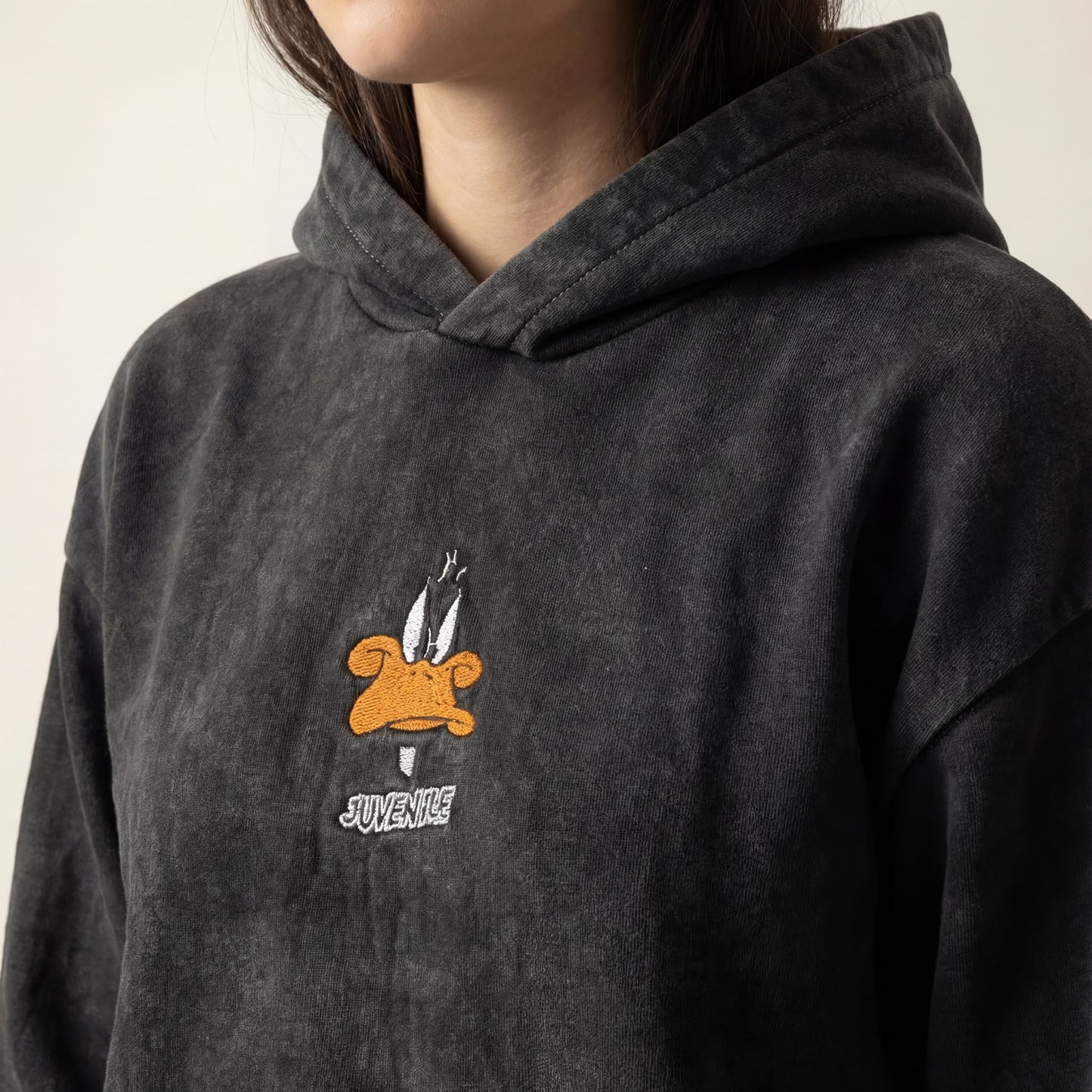 Daffy duck | Boxy fit acid washed black embroidered hoodie JUVENILE